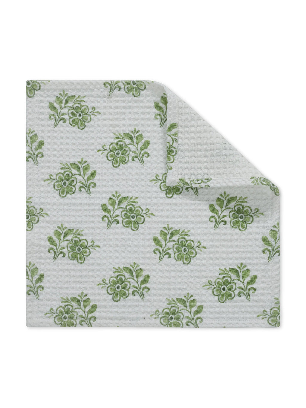 Floral patterned fabric with green flowers on a white background