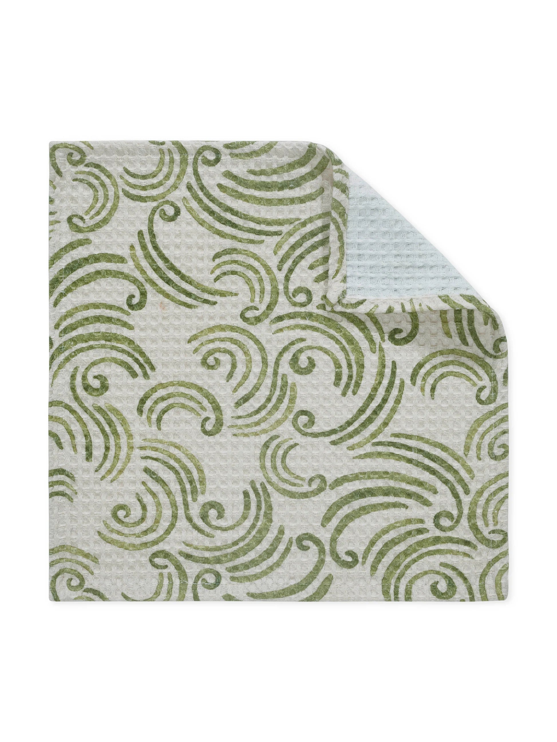 Textile with green wave pattern on a white background