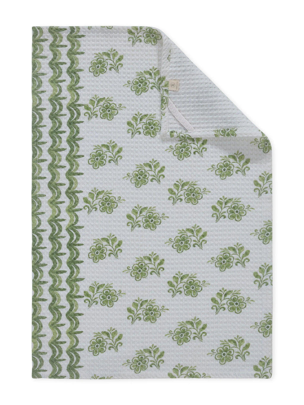 Green floral patterned fabric on a white background