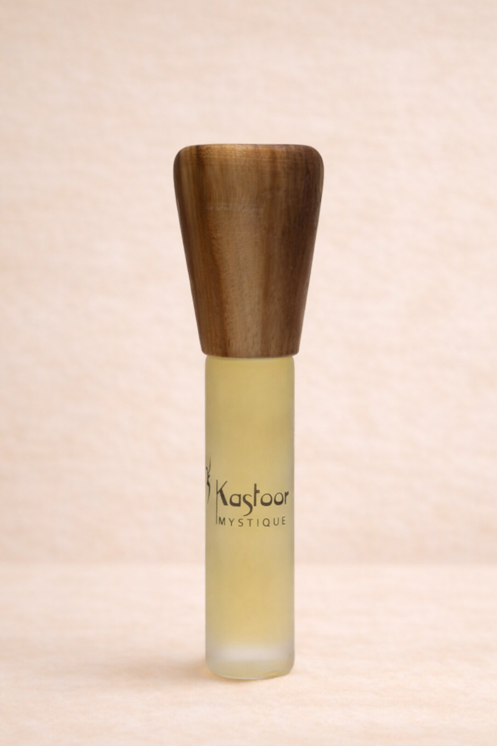 Fragrance bottle of Mystique with a wodden cap. Mystique fragrance.